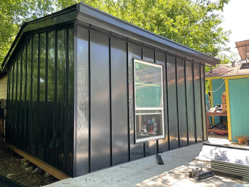 Black standing seam metal wall panels for Roof Inspection in Cascades